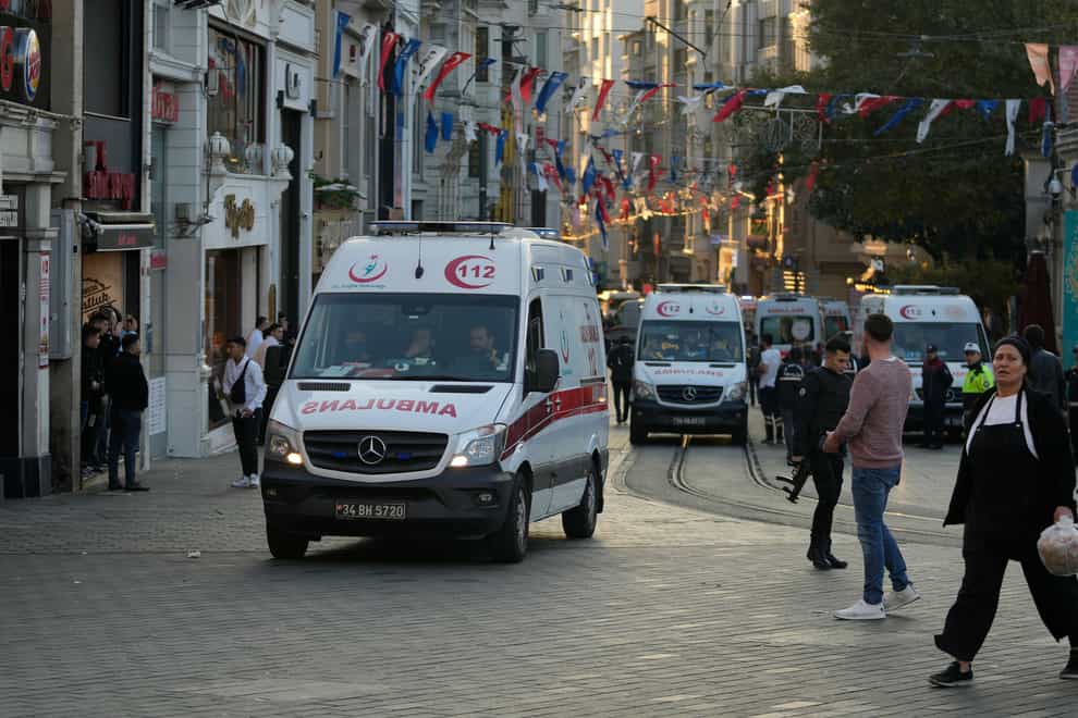 Security and ambulances at the scene on Istiklal Avenue (Francisco Seco/AP)