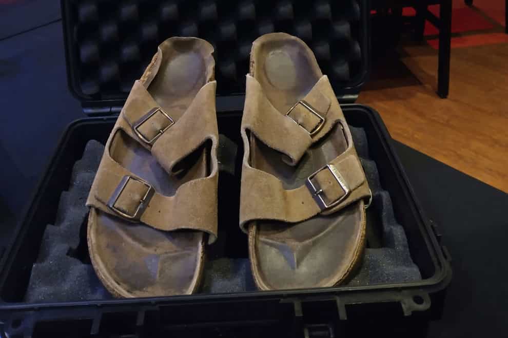 Steve Jobs’ Birkenstock sandals at the Hard Rock Cafe in New York (Julien’s Auctions via AP)