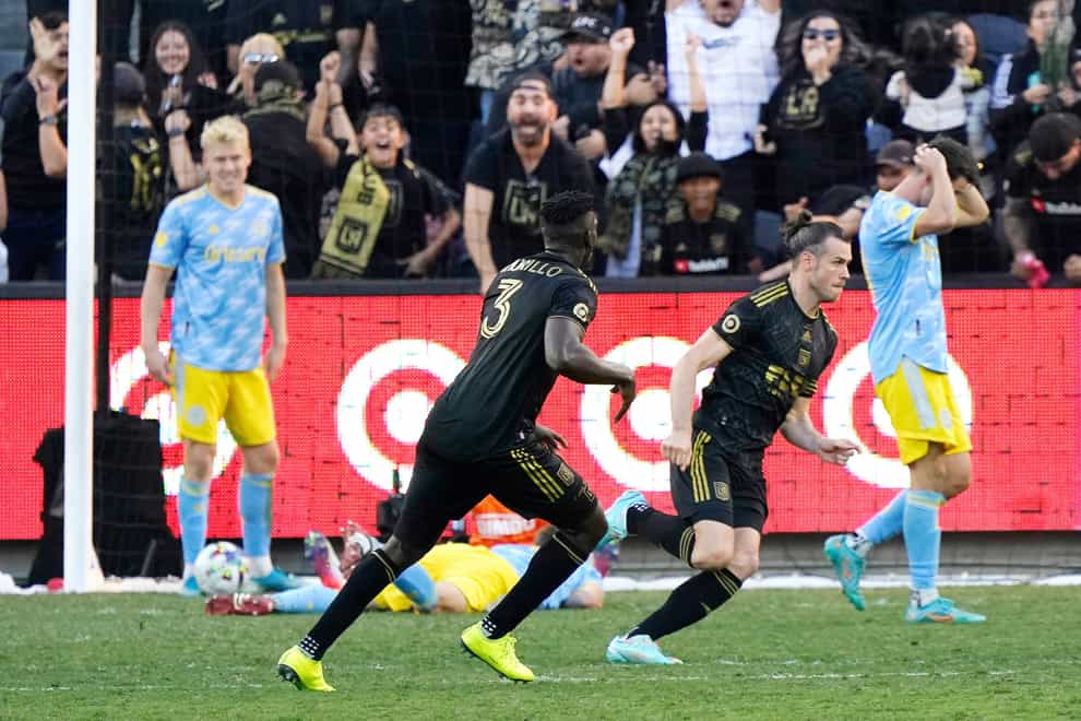 Gareth Bale, second from right, celebrates scoring for Los Angeles FC in the MLS Cup final against Philadelphia Union (Marcio Jose Sanchez/AP)