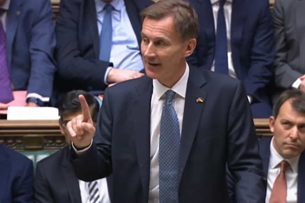 Chancellor of the Exchequer Jeremy Hunt delivers his autumn statement (House of Commons/PA)