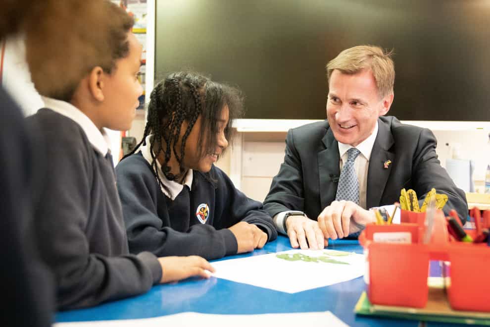 Chancellor of the Exchequer Jeremy Hunt at a visit to a school on Thursday (Stefan Rousseau/PA)