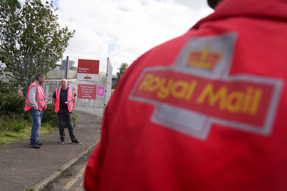 The CWU has announced six more strike dates for Royal Mail workers (Andrew Milligan/PA)