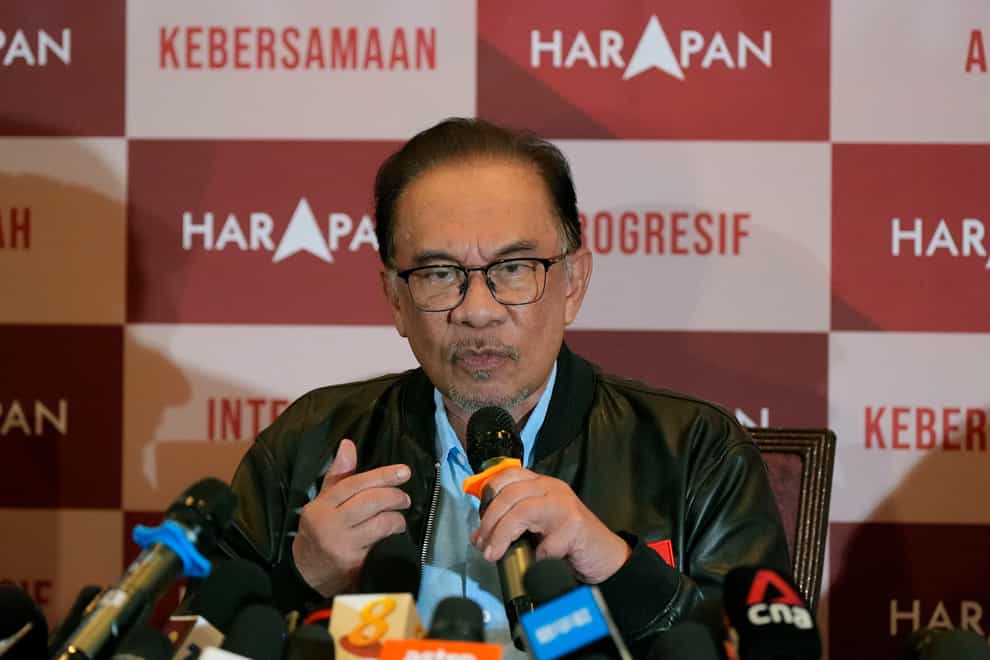 Malaysian opposition leader Anwar Ibrahim speaks during a press conference in Subang, Malaysia, Sunday, Nov. 20, 2022. Malaysia’s graft-tainted coalition that had ruled the country for decades is losing ground to rival Malay blocs but could still return to power depending on post-election alliances (Vincent Thian/AP/PA)