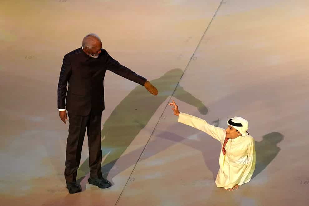 Morgan Freeman and Ghanim al Muftah during the opening ceremony (Adam Davy/PA)