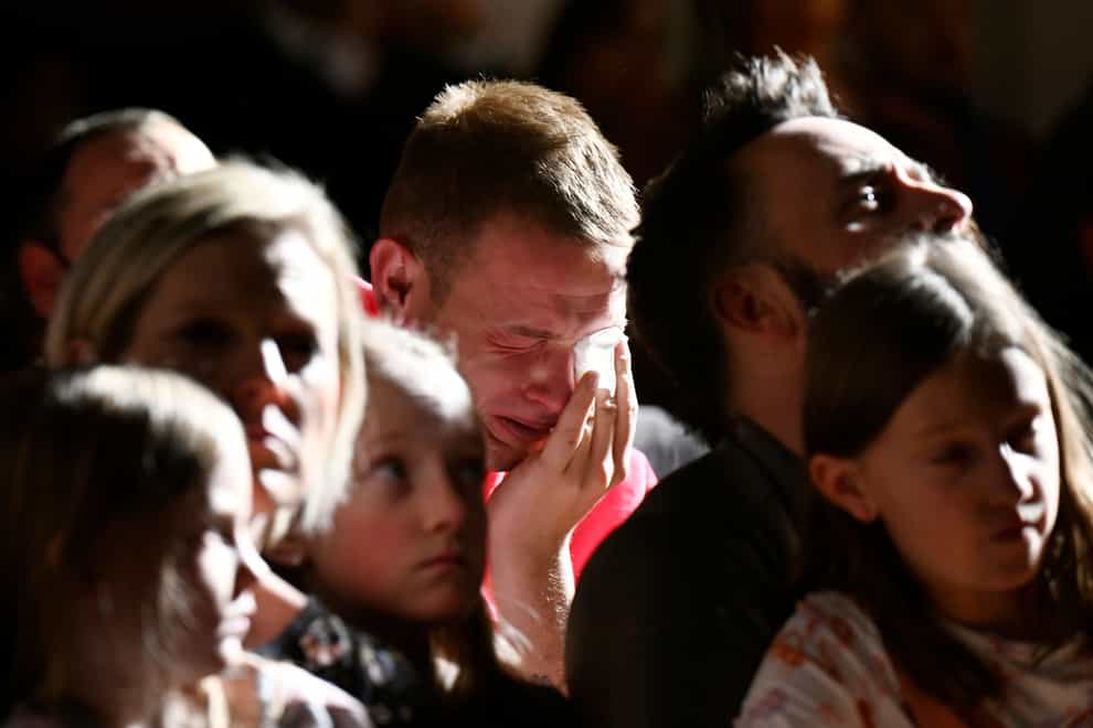 A vigil at All Souls Unitarian Church following the shootings (The Denver Post via AP)