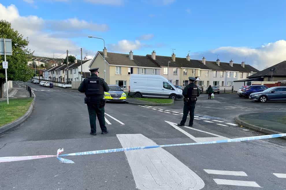 Officers from the PSNI at the scene, following the attempted murder of two officers in Strabane (PA)