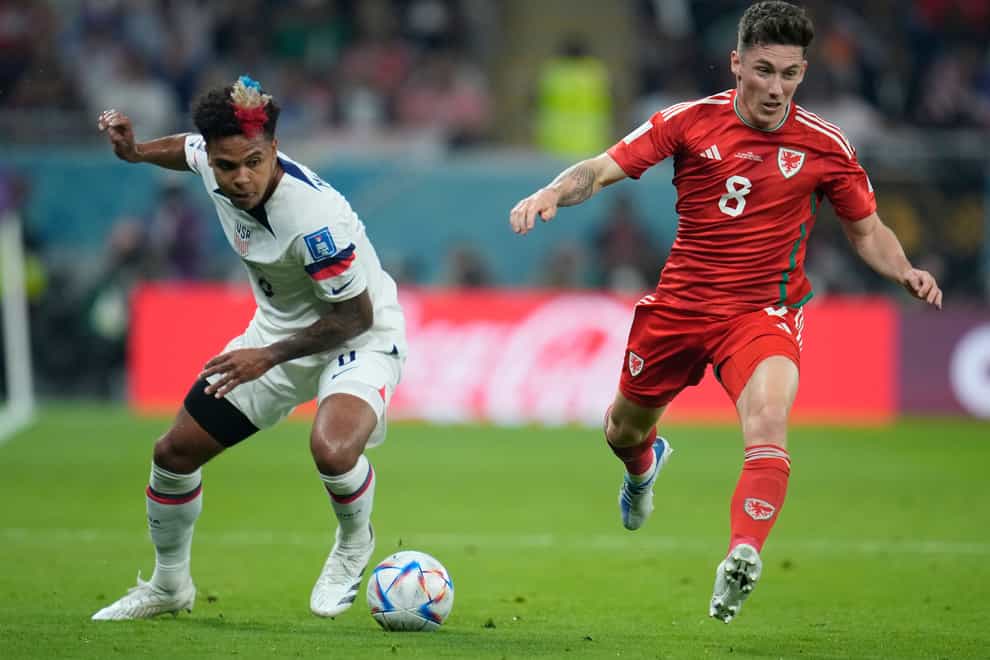 Harry Wilson (right) has warned Wales to expect an Iran backlash in their second World Cup game (Ashley Landis/AP)