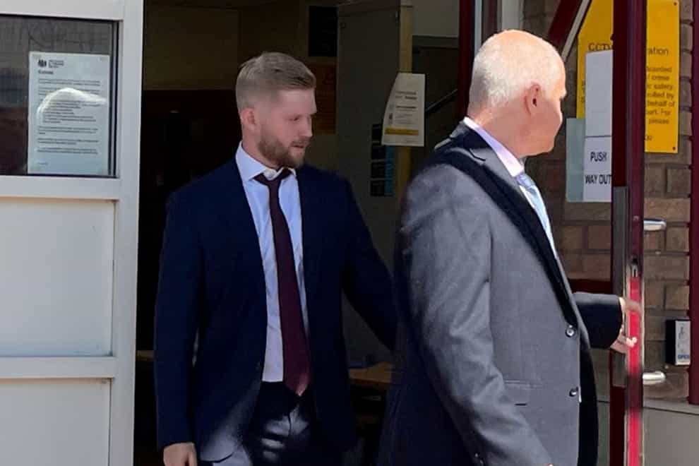 Charlie Thompson, left, a police constable with Essex Police, is seen leaving Basildon Magistrates’ Court (Isobel Frodsham/PA)