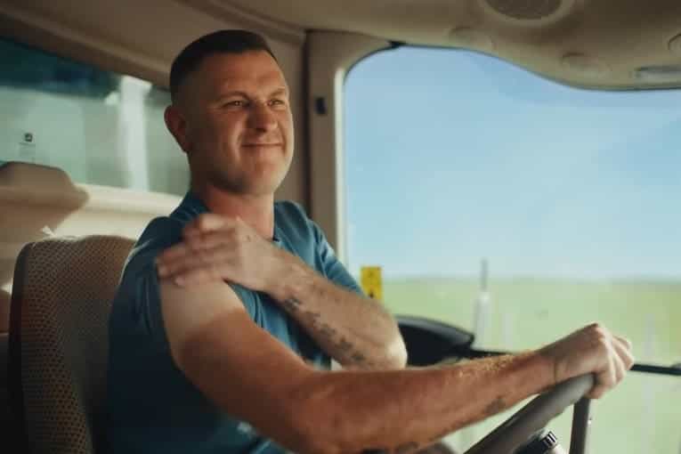 Screengrab taken of the scene in the Waitrose Christmas advert 2022 that showed two farmers comparing sun tans. Waitrose has altered the section of the advert following criticism by a skin cancer charity and patients (Waitrose/PA)