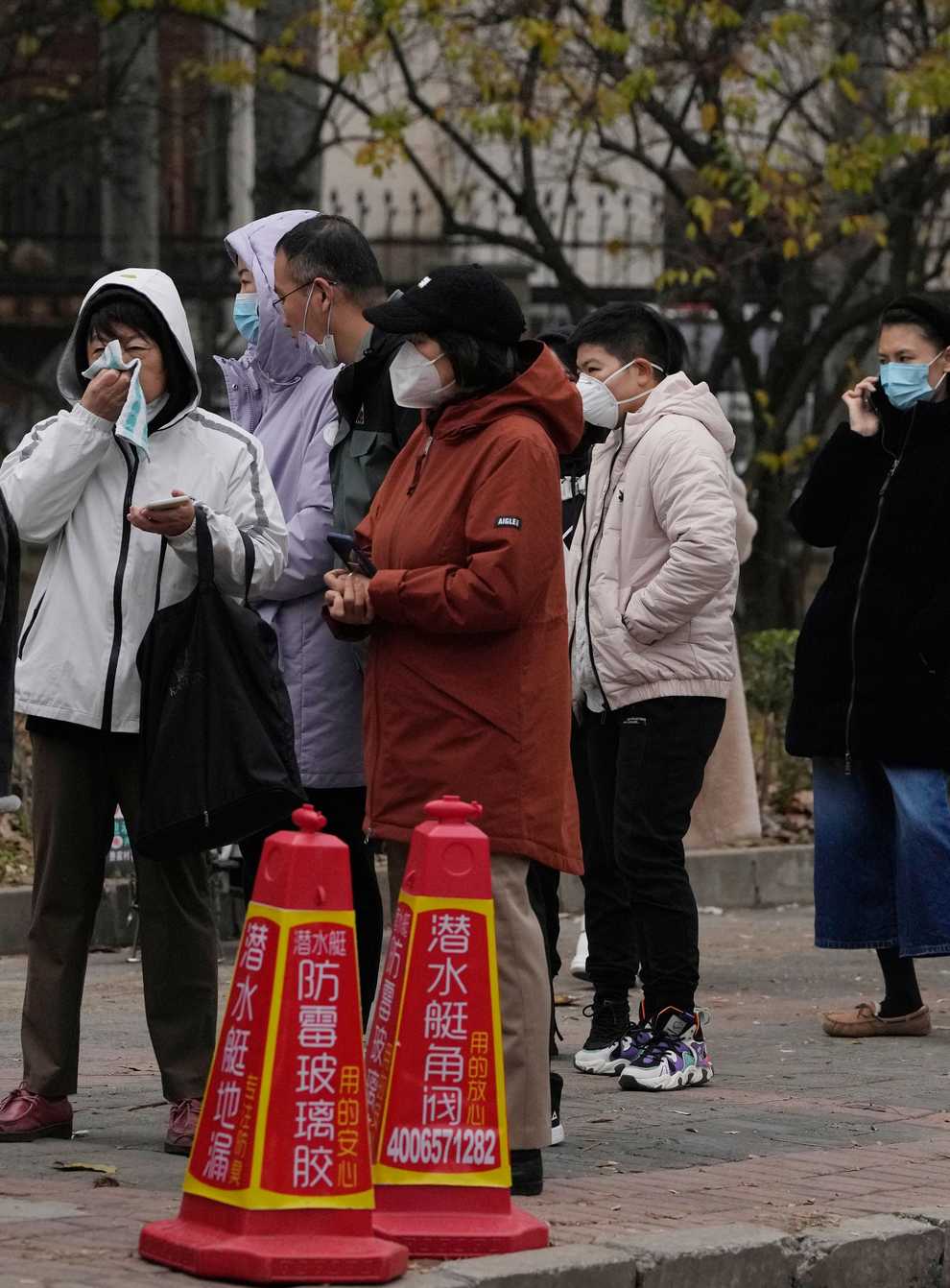 Residents line up for Covid tests in Beijing (AP)