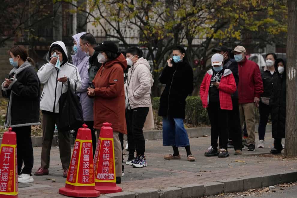 Residents line up for Covid tests in Beijing (AP)
