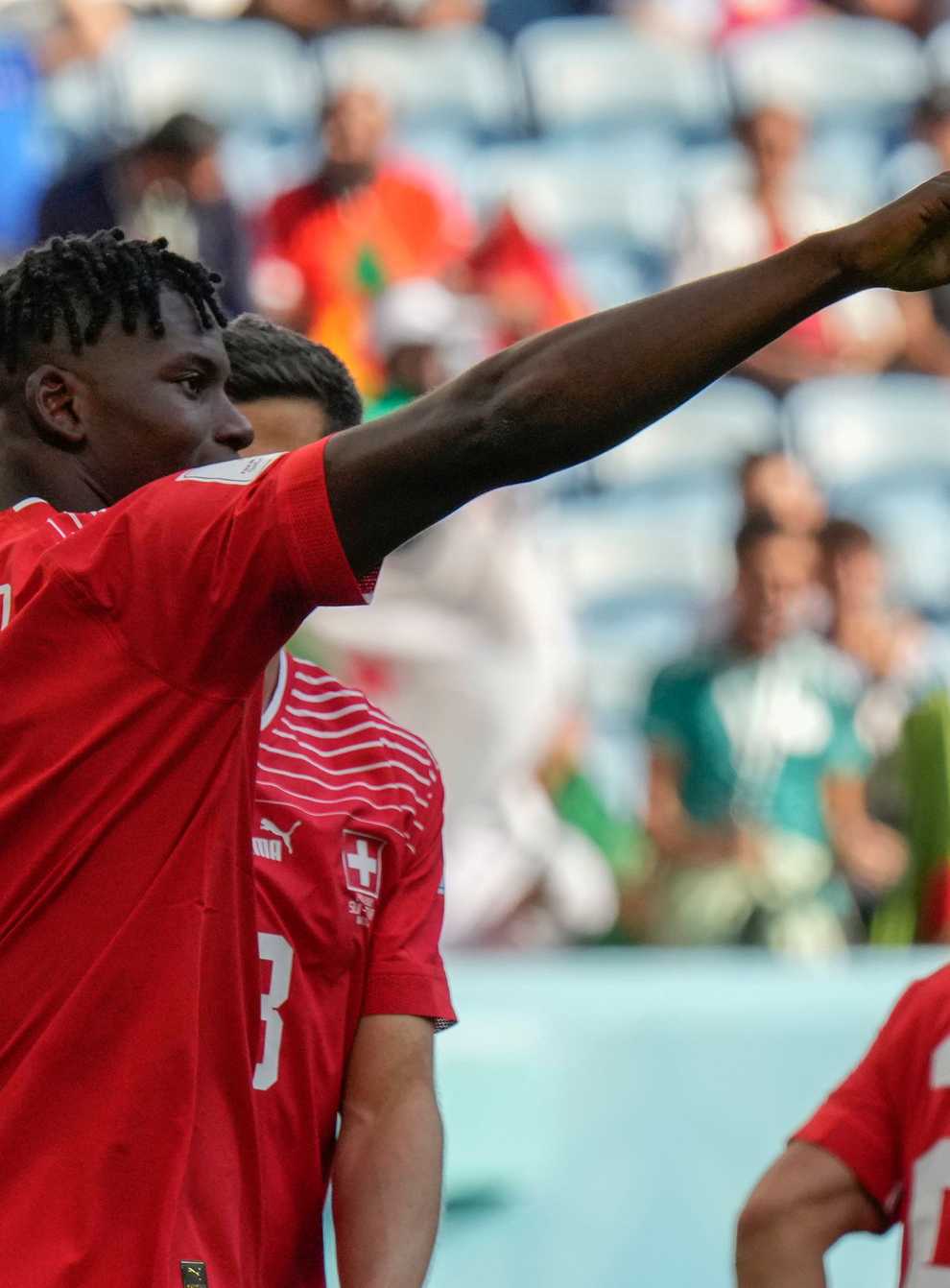 Switzerland’s Breel Embolo celebrates scoring the only goal in his side’s win over his native Cameroon (Luca Bruno/AP)