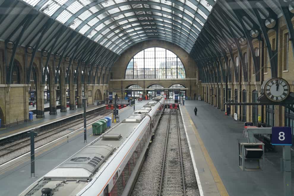 Empty platforms and a stationary train at Kings Cross station in London, as members of the drivers’ union Aslef go on strike (Victoria Jones/PA)