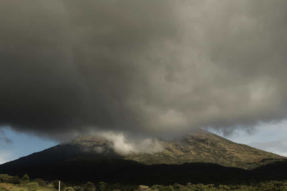 Clouds and gasses surround the Chaparrastique volcano in San Jorge, El Salvador (Salvador Melendez/AP)