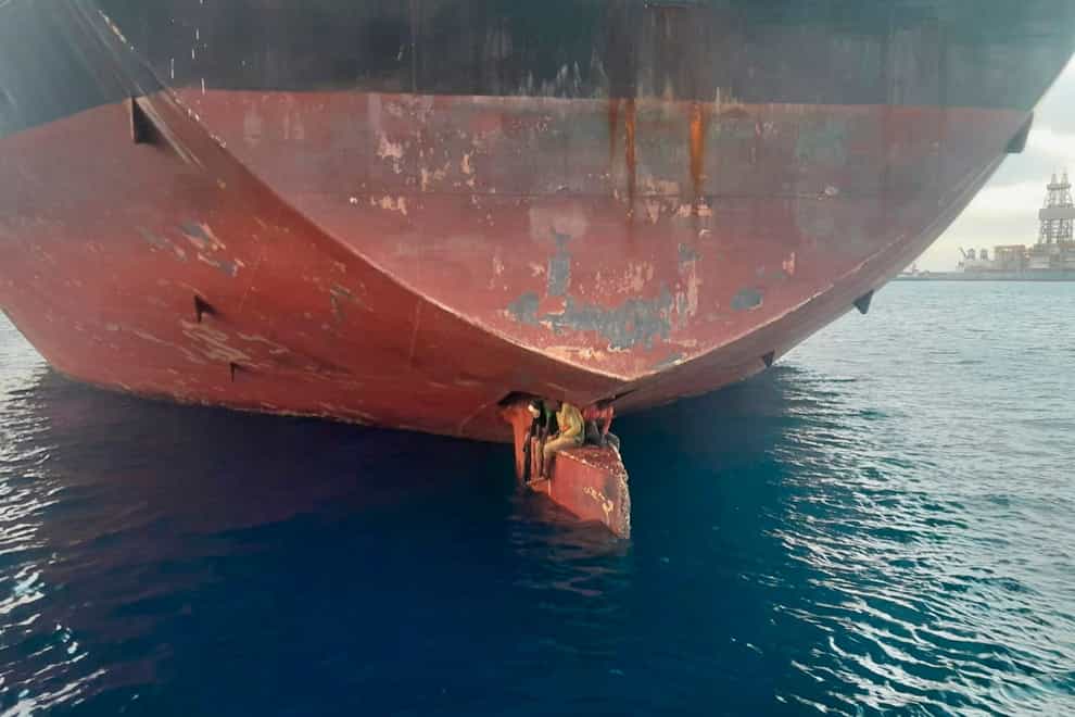 Three stowaways were discovered on a ship’s rudder after the vessel sailed to the Canary Islands from Nigeria, Spain’s Maritime Rescue Service said (Salvamento Maritimo/AP)