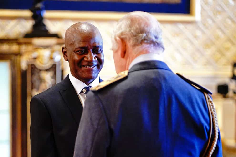 Gary Bennett, Patron of Show Racism The Red Card, is made a Member of the Order of the British Empire by King Charles III at Windsor Castle. The award was for services to anti-racism in football (Yui Mok/PA)