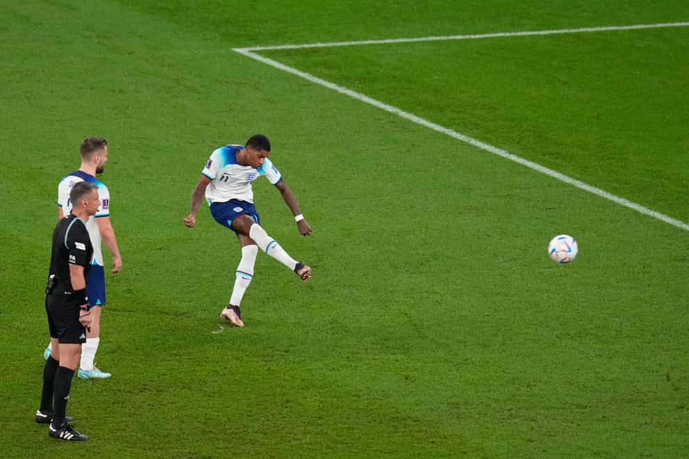 England’s Marcus Rashford scores his side’s first goal (Alessandra Tarantino/AP)
