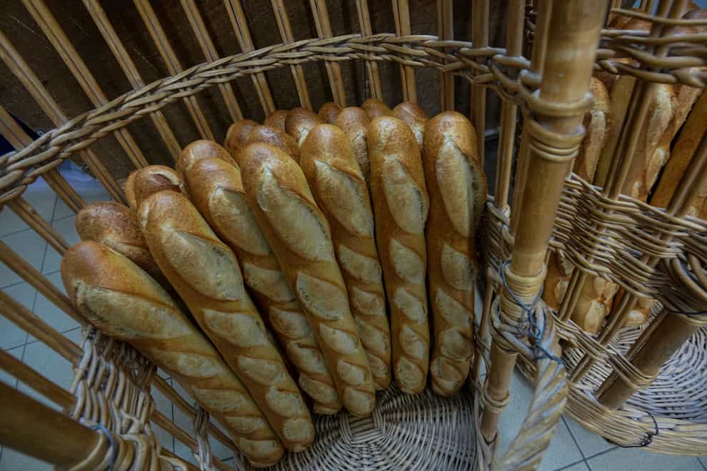 Baguettes in a basket in Paris (AP)