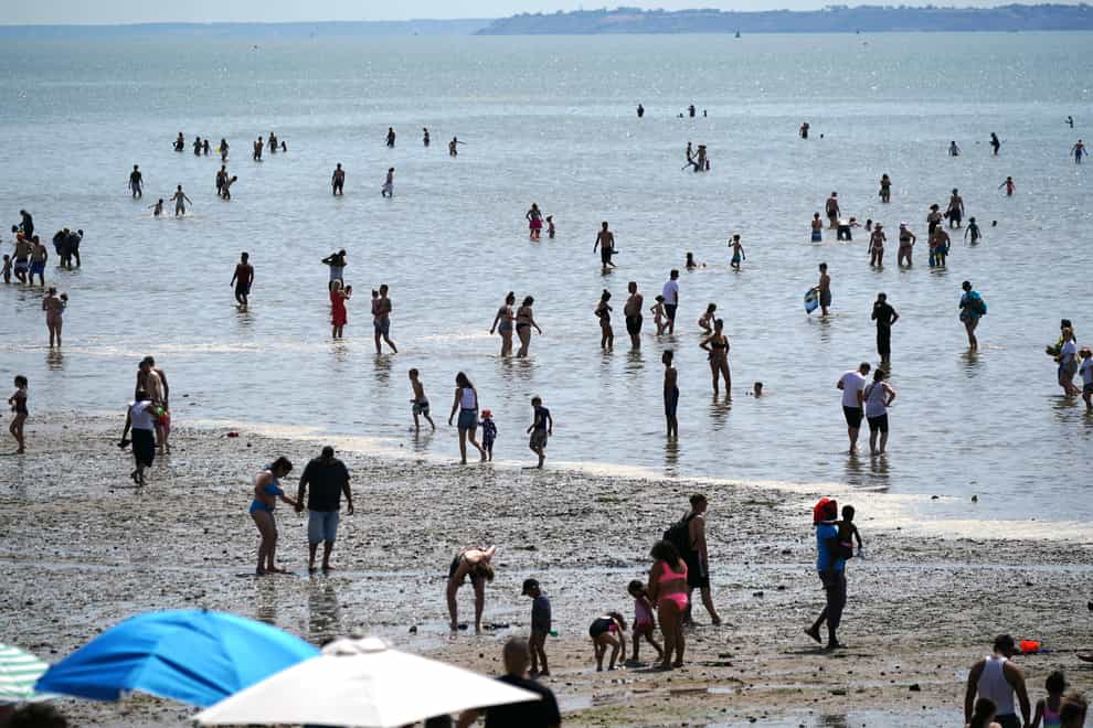 People bathing in the sea at Southend-on-Sea. Water quality was deemed ‘excellent’ by the Environment Agency at 72% of the country’s bathing sites (Yui Mok/PA)