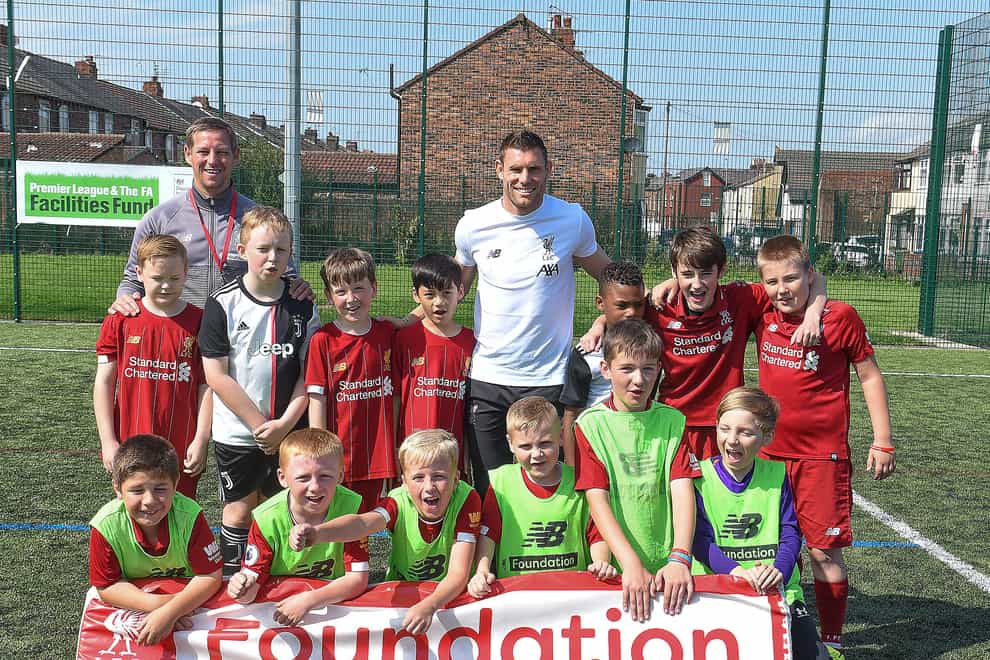 Liverpool midfielder James Milner joins some youngsters at an LFC Foundation event (LFC Foundation Handout/PA)