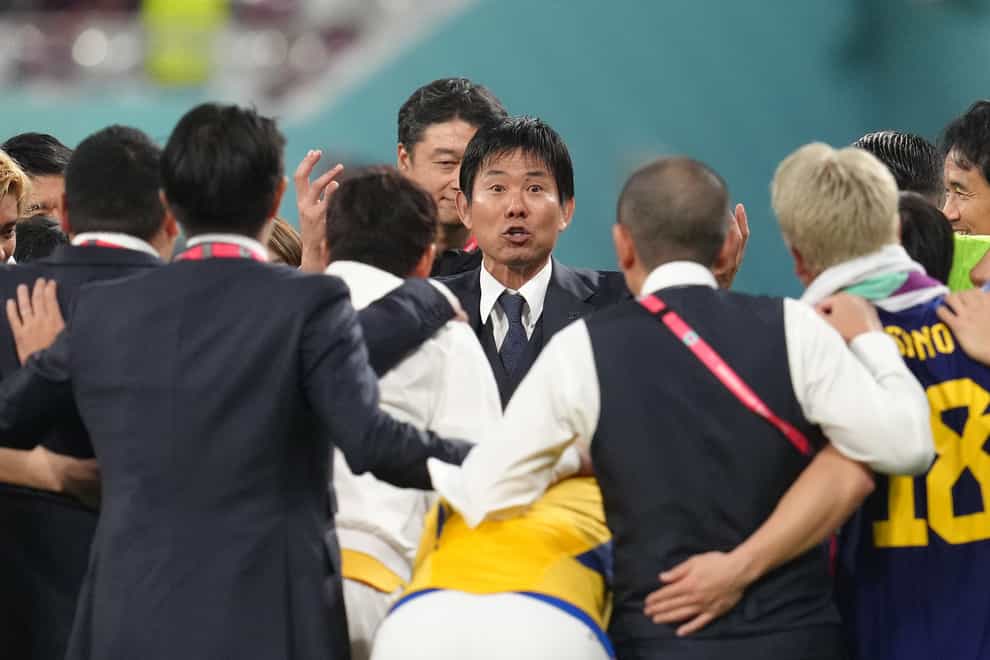 Japan manager Hajime Moriyasu (centre) guided his side to another memorable World Cup victory (Nick Potts/PA)
