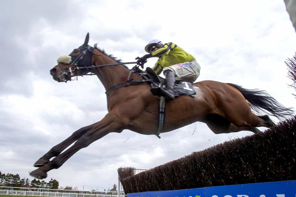 Allmankind ridden by Harry Skelton clears a fence on their way to winning the Jordan Electrics Ltd Future Champion Novices’ Chase during the Coral Scottish Grand National Day at Ayr Racecourse. Picture date: Sunday April 18, 2021.