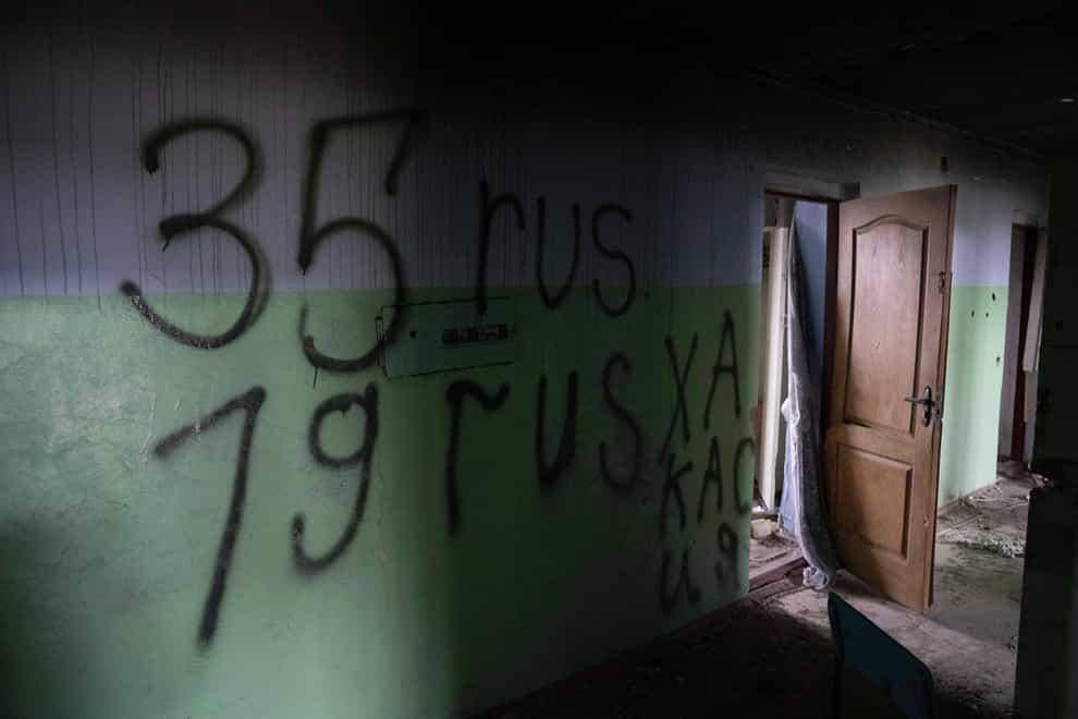 Writing on the wall by Russian forces in the college which they used as a base in the recently retaken town of Arhanhelske (AP)