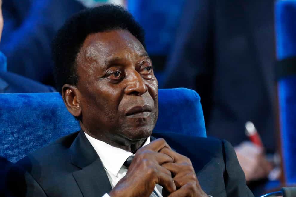 FILE – Brazilian Pele attends the 2018 soccer World Cup draw at the Kremlin in Moscow, Dec. 1, 2017. Brazilian soccer great Pelé was hospitalized in Sao Paulo to regulate the medication in his fight against a colon tumor, his daughter said on Wednesday, Nov. 30, 2022. Kely Nascimento added that there was “no emergency” concerning her 82-year-old father’s health. (AP Photo/Alexander Zemlianichenko, File)