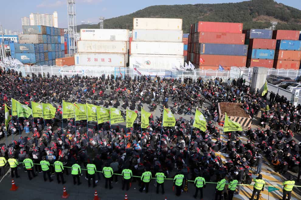 Members of the Korean Confederation of Trade Unions stage a rally to support the ongoing strike by truckers (Yonhap via AP)