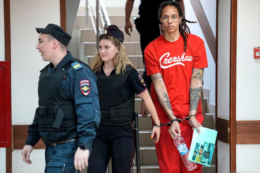 Brittney Griner is escorted to a courtroom for a hearing in Khimki just outside Moscow on July 7 2022 (Alexander Zemlianichenko/AP)