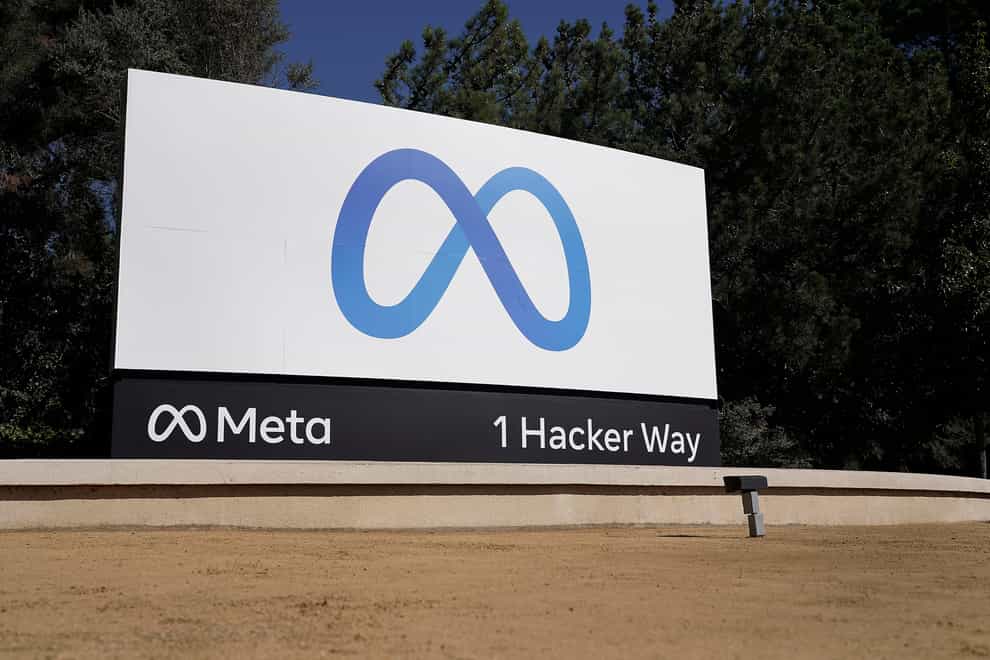 Facebook’s Meta logo sign is seen at the company headquarters in Menlo Park, California (Tony Avelar/AP)