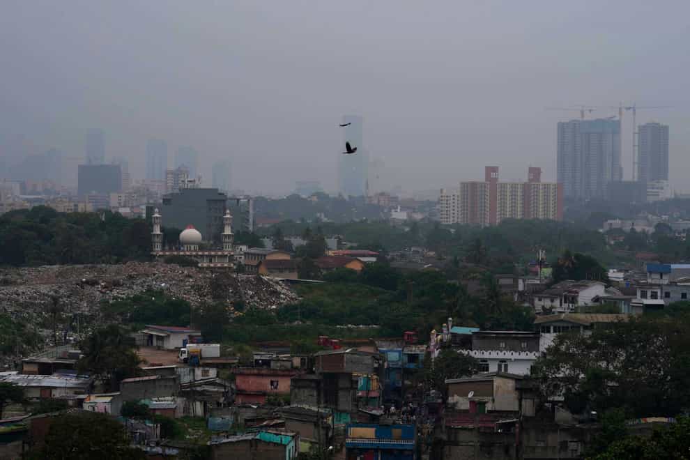 Smog and fog envelop the skyline in Colombo (AP)
