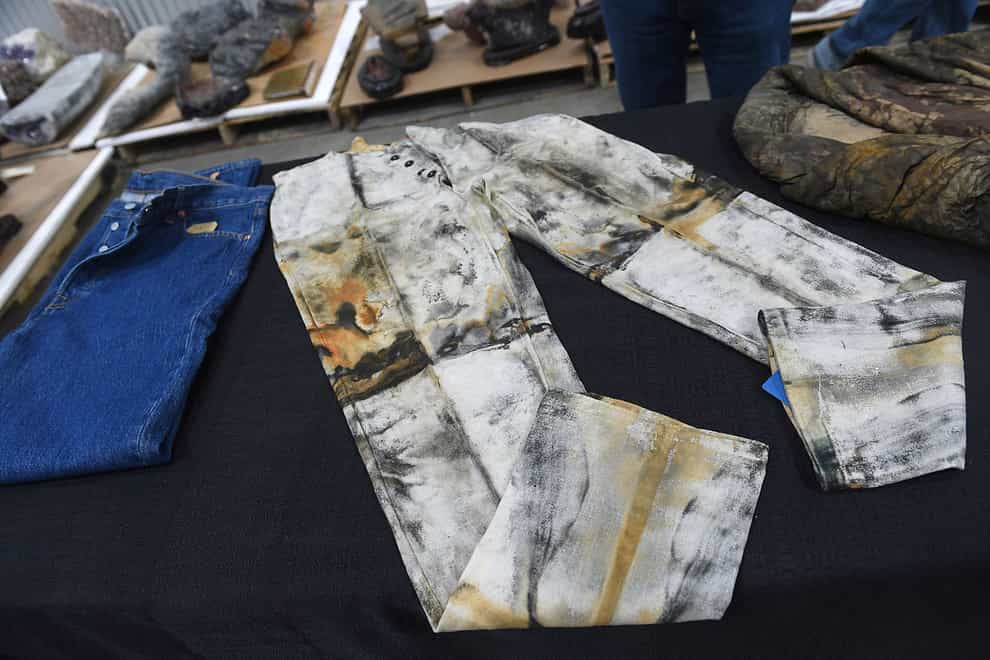A pair of work pants, possibly made by or for Levi Strauss, from the SS Central America in a warehouse in Nevada (Jason Bean/The Reno Gazette-Journal via AP/PA)