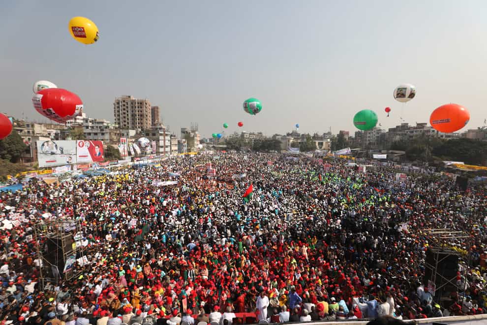Bangladesh National Party (BNP) supporters shout slogans during a rally in Dhaka, Bangladesh, Saturday, Dec. 10, 2022. Tens of thousands of opposition supporters rallied in Bangladesh’s capital on Saturday to demand the government of Prime Minister Sheikh Hasina resign and install a caretaker before next general elections expected to be held in early 2024. (AP Photo/Mahmud Hossain Opu)