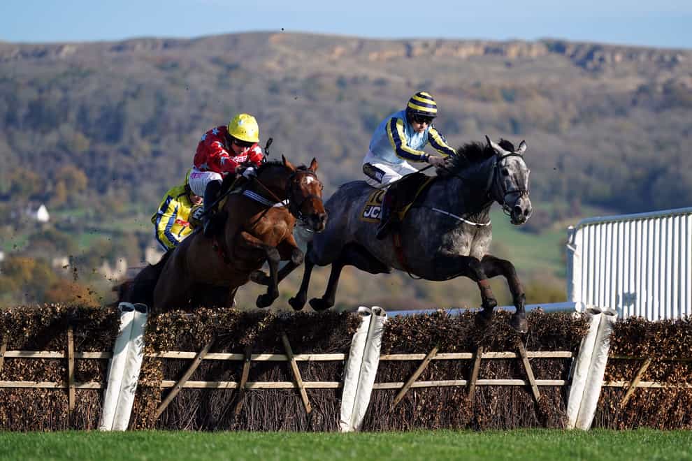 Scriptwriter (left) clears the last fence on his way to winning the JCB Triumph Trial Juvenile Hurdle on day two of The November Meeting at Cheltenham Racecourse. Picture date: Saturday November 12, 2022 (Tim Goode/PA)