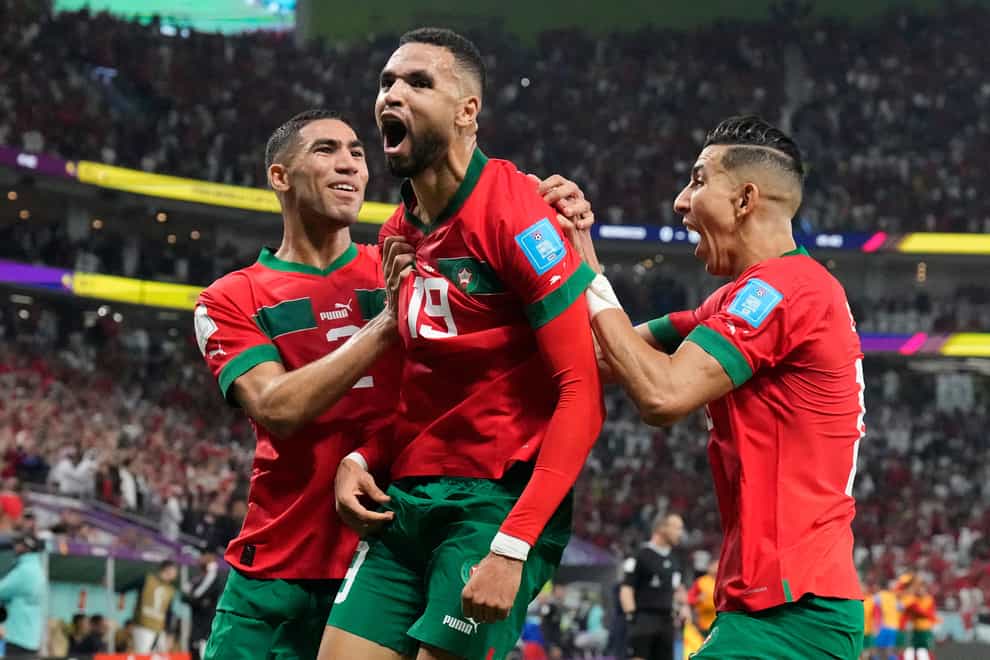 Youssef En-Nesyri (centre) celebrates his goal (Martin Meissner/AP)