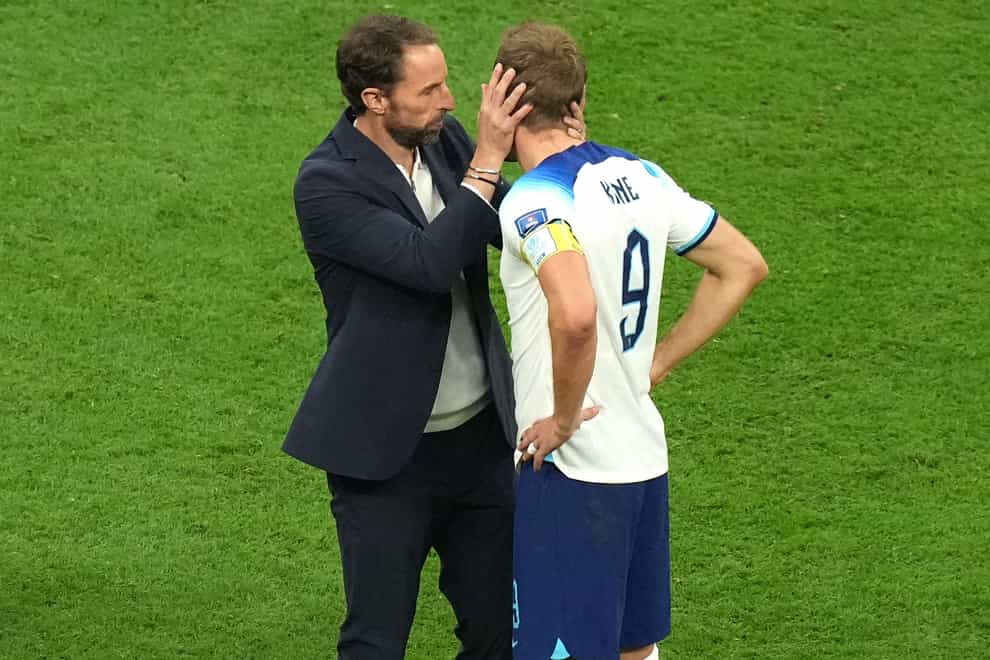Gareth Southgate consoles Harry Kane after England’s defeat (Peter Byrne/PA)