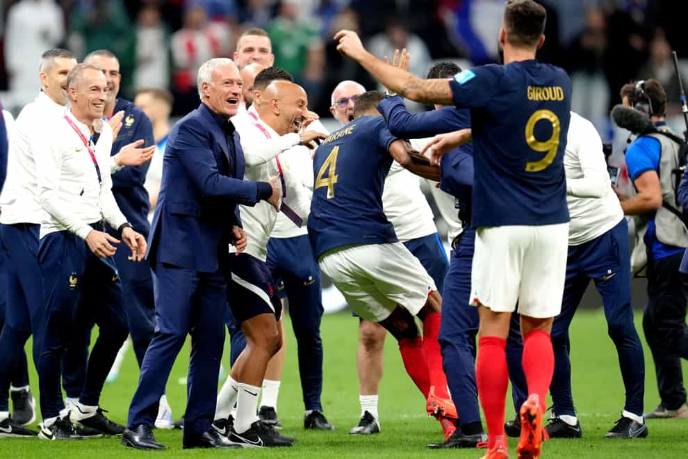 Didier Deschamps (centre) celebrates at full-time after France’s victory (Nick Potts/PA)
