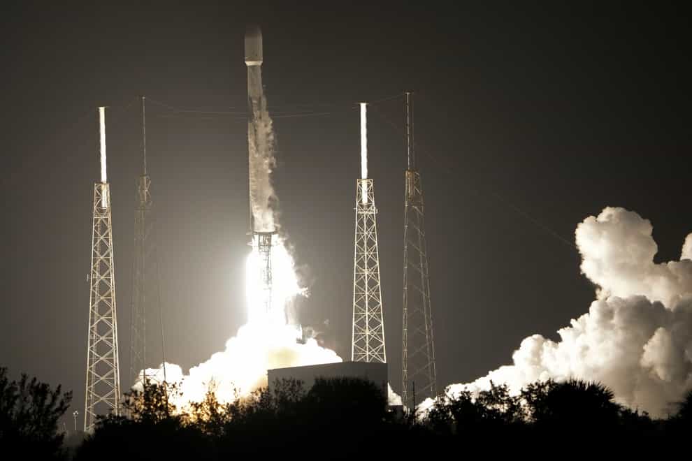 The SpaceX Falcon 9 rocket, with a payload including two lunar rovers from Japan and the United Arab Emirates, lifts off from the Cape Canaveral Space Force Station in Florida (John Raoux/AP)