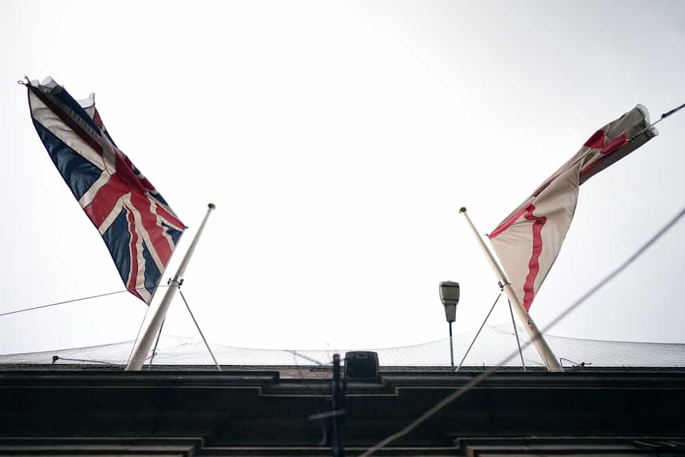 The Union flag and the flag of Jersey fly at half-mast over St Helier Town Hall, following a fishing boat crash which killed three and an explosion at a block of flats which left at least five dead (Aaron Chown/PA)