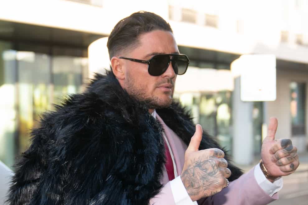 Reality TV star Stephen Bear arrives at Chelmsford Crown Court, Essex, on the first day of his trial. (Joe Giddens/ PA)