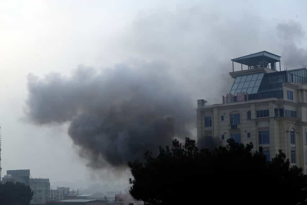 Smoke rises from a hotel after an explosion and gunfire in the city of Kabul, Afghanistan (AP)