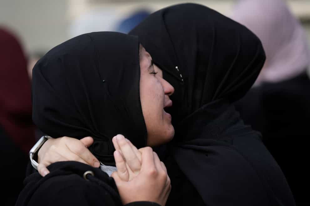 Palestinian women react during the funeral of Jana Zakaran, 16, in the West Bank city of Jenin (Majdi Mohammed/AP)