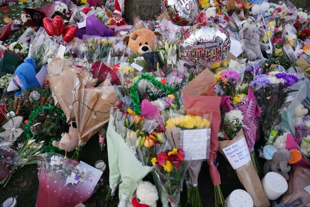 Flowers and tributes were left for the boys (Jacob King/PA)