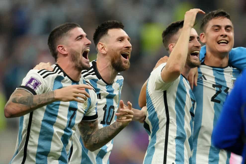 Lionel Messi, second left, celebrates with his team after victory over Croatia (Nick Potts/PA)