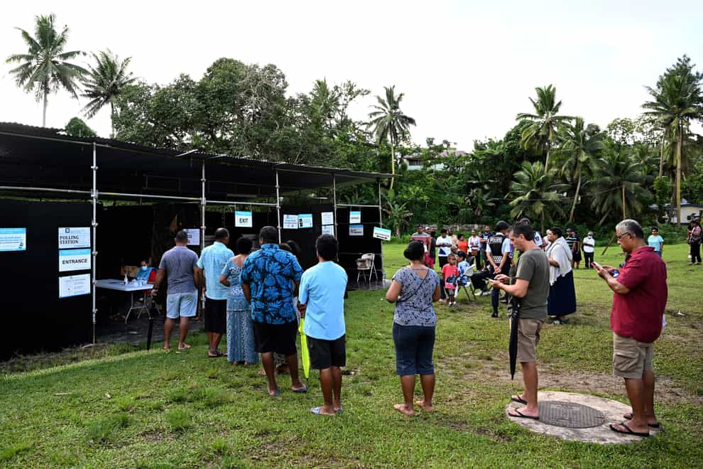 People line up to cast their votes in the Fiji general election in Suva (Mick Tsikas/AAP Image/AP)