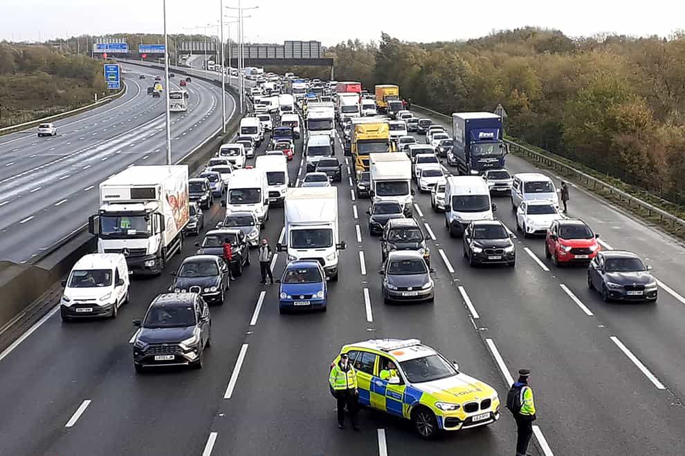 Traffic halted on the M25 by a Just Stop Oil protest (Just Stop Oil/PA)