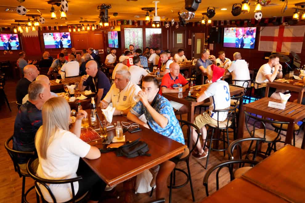 Fans gather at the Red Lion Pub & Restaurant in Doha, Qatar (Jonathan Brady/PA)