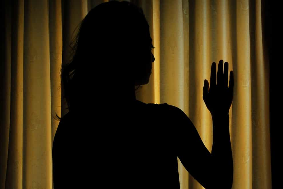 PICTURE POSED BY MODEL. The silhouette of a woman (Anna Gowthorpe/PA)