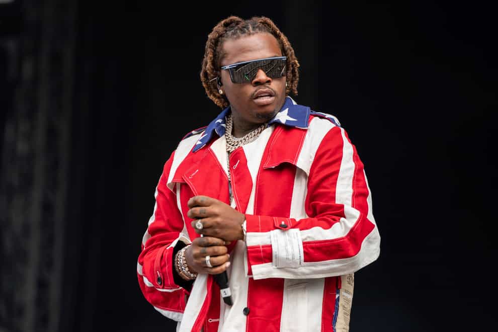 US rapper Gunna, who was arrested earlier this year along with fellow rapper Young Thug and more than two dozen other people, has pleaded guilty in Atlanta to a racketeering conspiracy charge, according to a statement released by his attorneys (Scott Garfitt/AP)